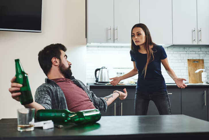 Woman speaks out at party